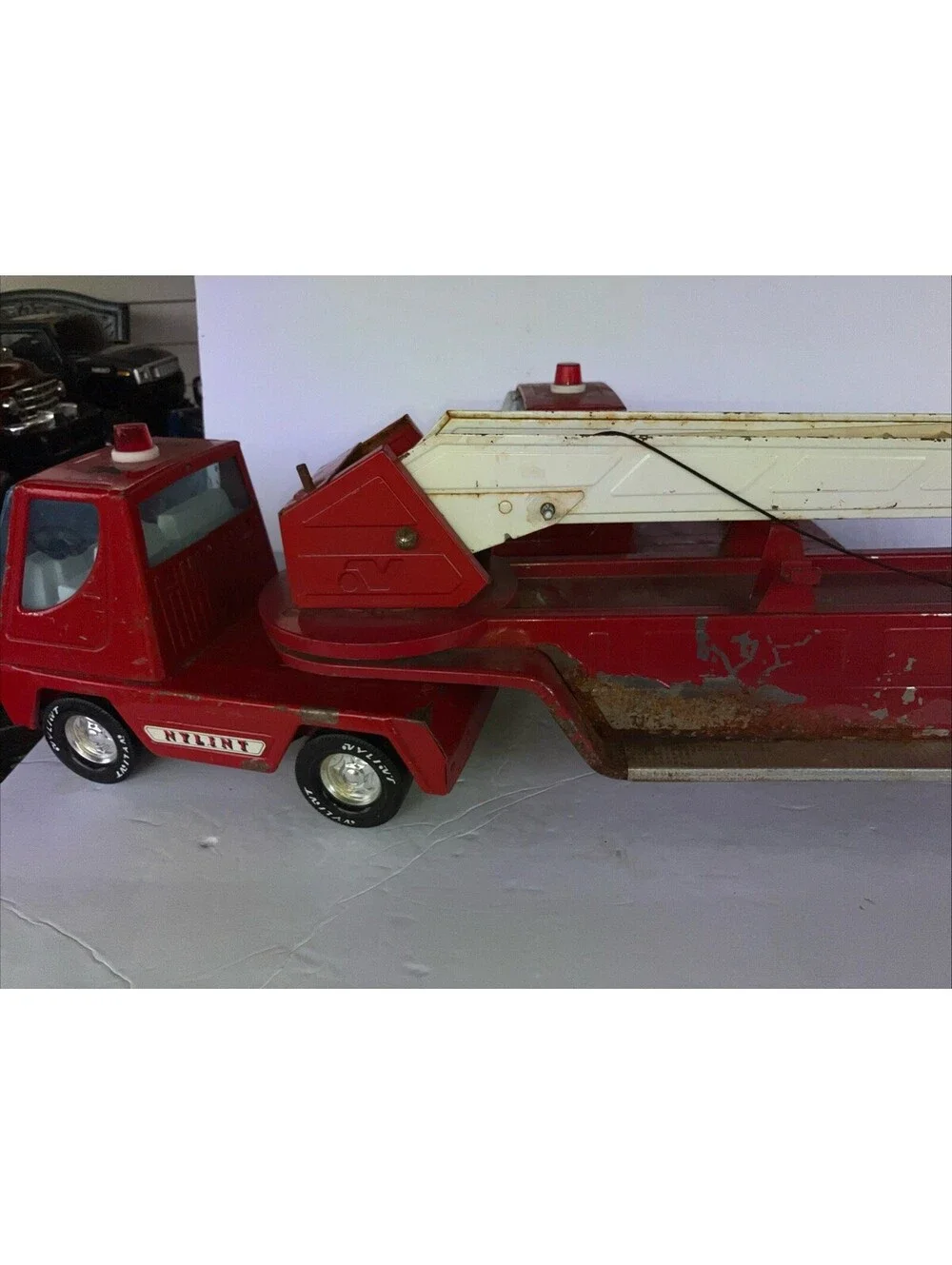Vintage 1970’s Nyline Aerial Hook-n-ladder Metal Fire truck 30.5 Inch 2 Cabs